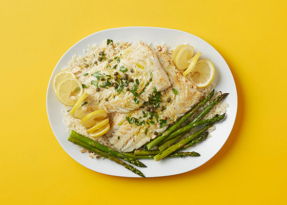 Baked Halibut with Butter and Capers Herbed Lemon Rice and Roasted Asparagus